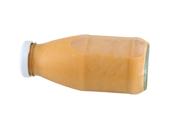 Botella de vidrio de leche aislada en un blanco . — Foto de Stock