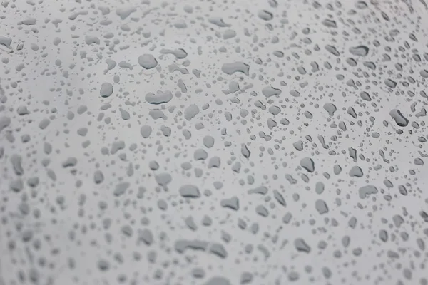 Dešťové kapky na skleněném pozadí. — Stock fotografie