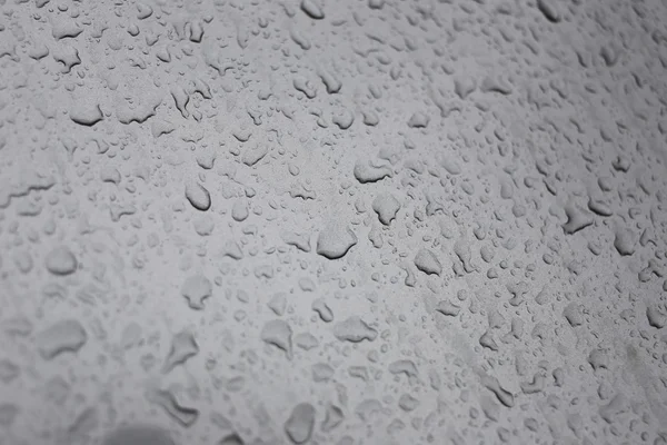 Gotas de lluvia sobre fondo de vidrio. —  Fotos de Stock