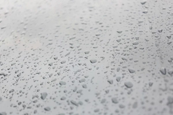 Gotas de lluvia sobre fondo de vidrio. —  Fotos de Stock