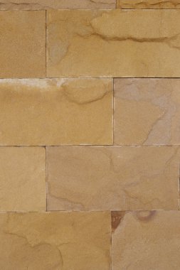 Arka plan tasarımı için kahverengi taş duvar.