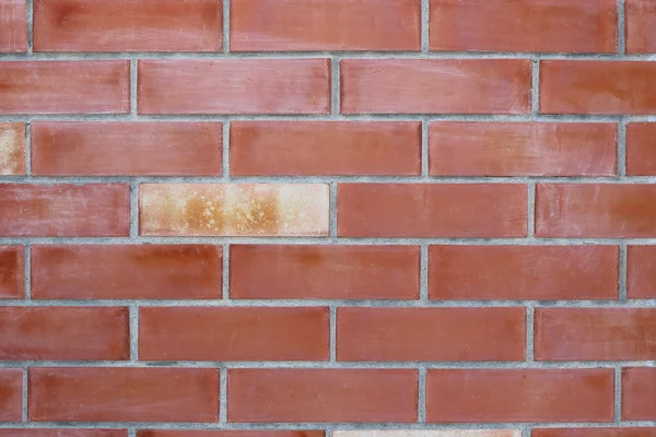 Oude bakstenen muur voor de achtergrond. — Stockfoto