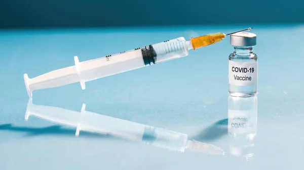 Coronavirus vaccine with syringe