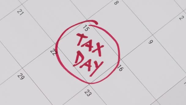 Tax day marked on calendar — Stock Video