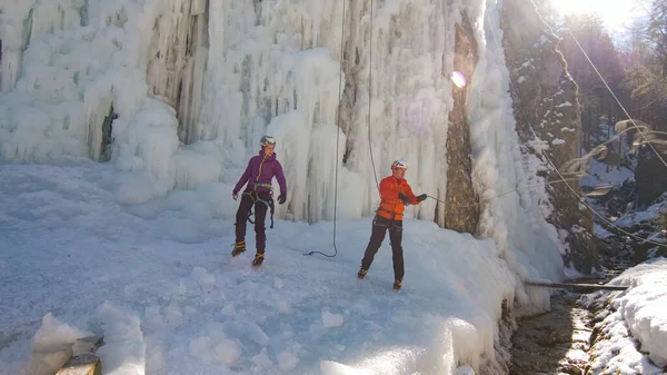 Ice climbers in protective clothes — Stock Photo, Image