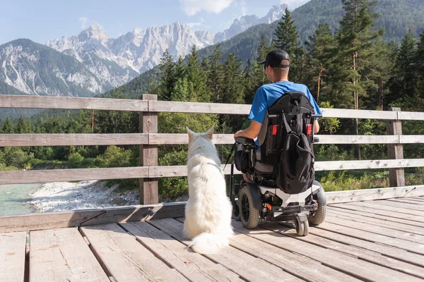 Disabled man with his dog — Stock Photo, Image