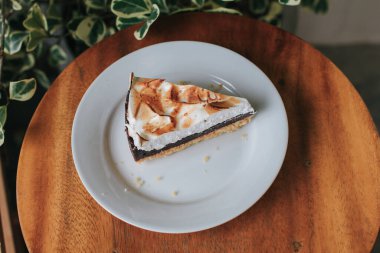 Lemon curd and meringue horizontal. Traditional french sweet pastry tart. Delicious, appetizing, homemade dessert with lemon curd cream. Copy space