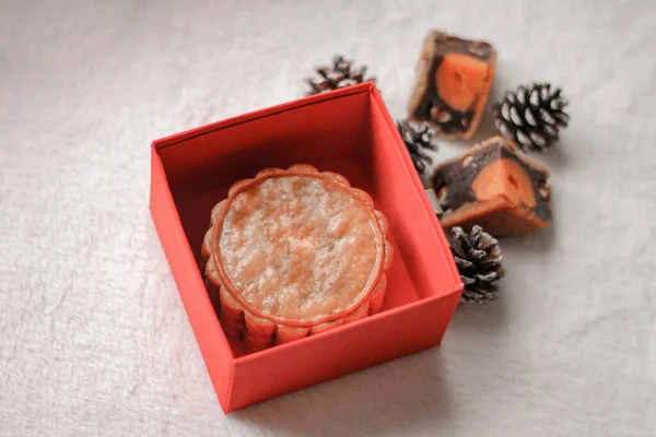 Traditional Moon Cake inside a red box during the Mid-Autumn Festival or Moon cake Festival