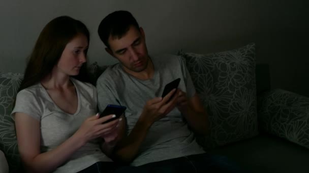 Man Woman Watch Something Funny Smartphones While Works Couple Smile — ストック動画