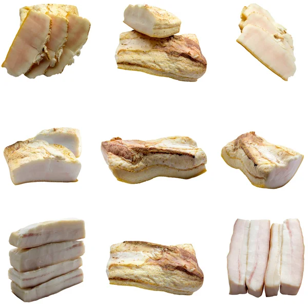 Pieces of crude fat of pork are isolated on a white background. — Stock Photo, Image