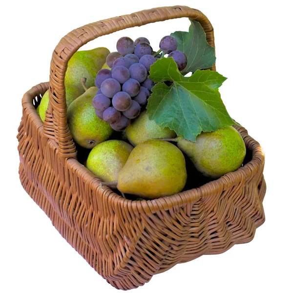 Korg med päron och vindruvor. — Stockfoto