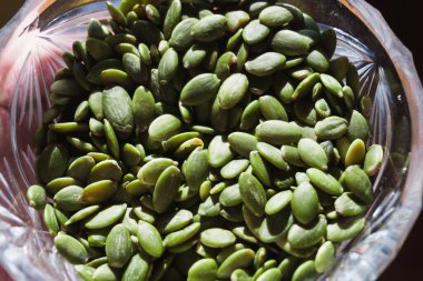 Yeşil kabak çekirdekleri, sağlıklı ve besleyici yiyecekler, düzgün beslenme ve sağlık hizmetleri, yeşil kabak çekirdekleri. Yüksek kalite