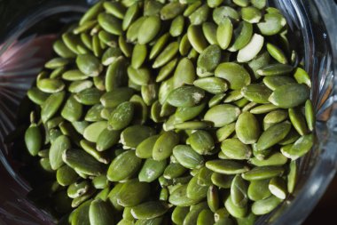 Yeşil kabak çekirdekleri, sağlıklı ve besleyici yiyecekler, düzgün beslenme ve sağlık hizmetleri, yeşil kabak çekirdekleri. Yüksek kalite