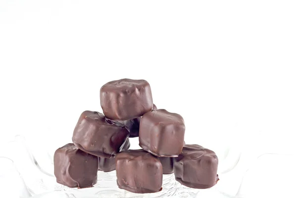 Malvaviscos de chocolate sumergidos a mano Imagen de stock