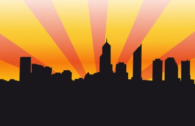 Gün batımı ve ışık ışını ile şehir manzarası