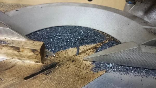 Metal shavings, close upmetal shavings on a miter saw