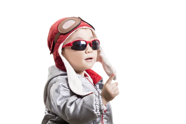 Šťastné dítě helmu pilota hraje — Stock fotografie