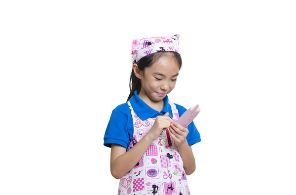 Lachende meisje gekleed als een kok — Stockfoto