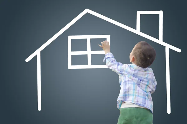 Розумна дитина малює новий будинок Стокова Картинка