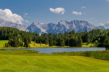 Holiday Feeling aound the beautiful Wagenbruch Lake in Bavaria clipart