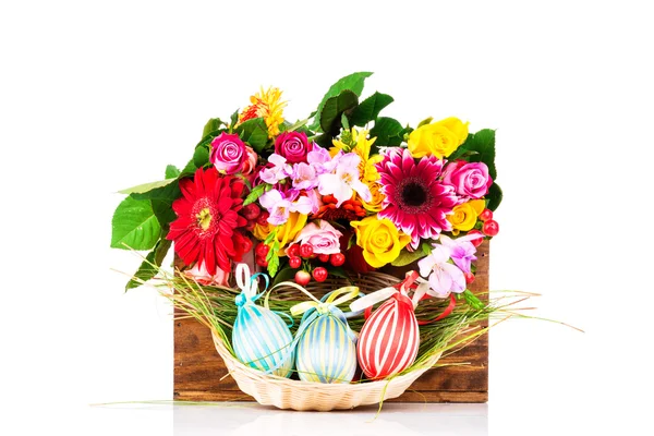 Easter eggs and flowers — Stock Photo, Image