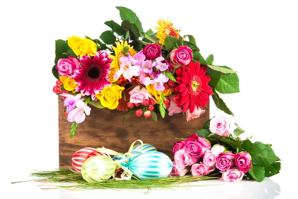 Easter eggs and flowers — Stock Photo, Image