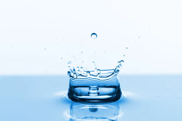 Water splash on white — Stock Photo, Image