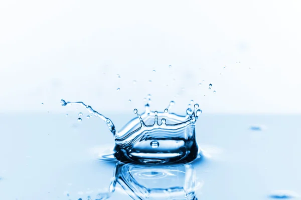 Water splash on white — Stock Photo, Image