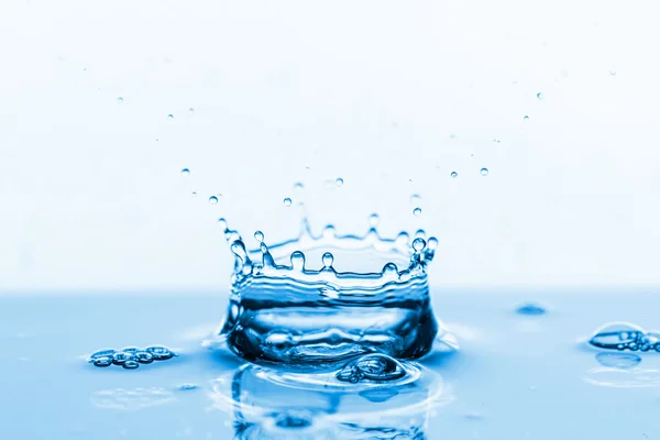 Water splash on white — Stock Photo, Image