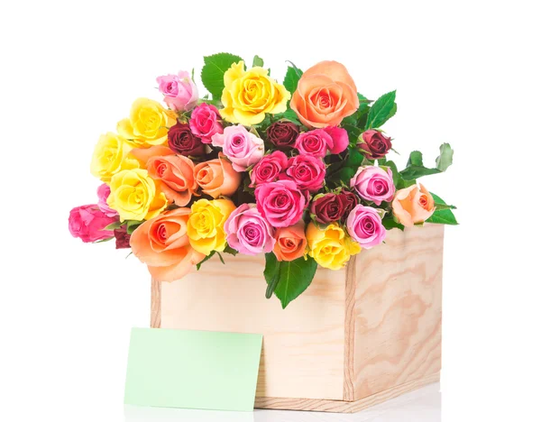 Róże i karta z pozdrow. — Zdjęcie stockowe