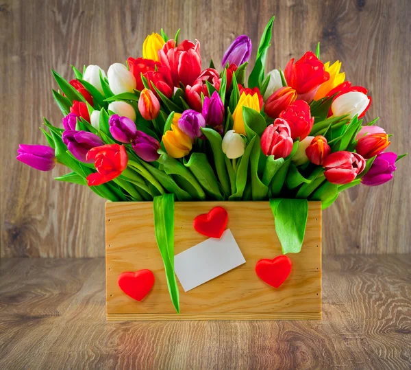 Beautiful tulips in box — Stock Photo, Image