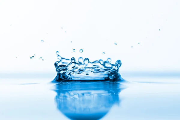 Blue water splash — Stock Photo, Image