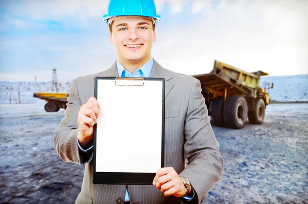 Engineer with blank sheet of paper — Stock Photo, Image