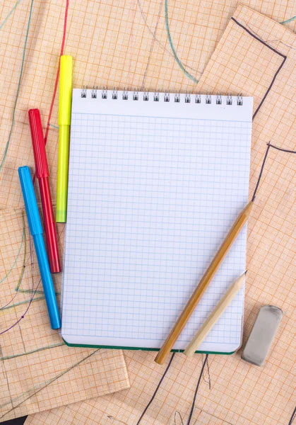 Open saved properties on the background of graph paper — Stock Photo, Image