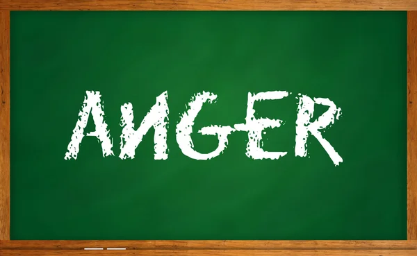 Sebuah kata kemarahan tertulis di papan tulis — Stok Foto
