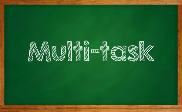 A Multi-task word written on chalkboard — Stock Photo, Image