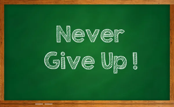 Word Never Give Up! written on chalkboard — Stock Photo, Image