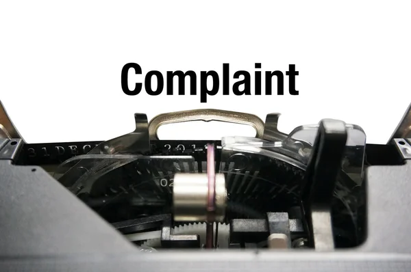 Complaint on typewriter — Stock Photo, Image