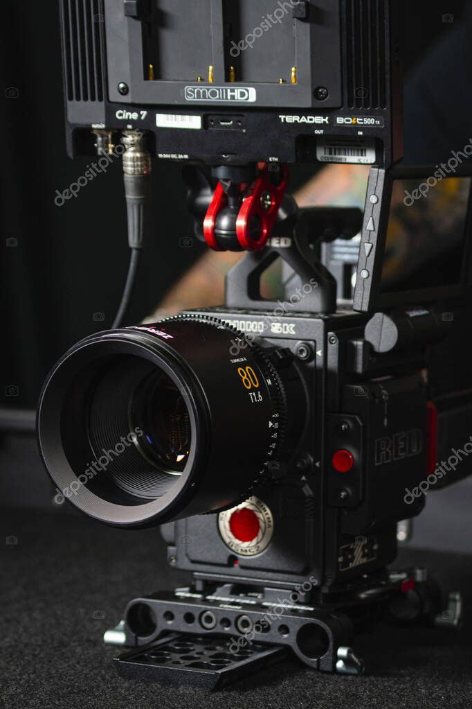 Kyiv, Ukraine - 04.17.2020: Studio shoot of professional 5k video camera Red DSMC2 with lens Leica Zerooptik Summilux-r 80, close-up. Professional equipment for cinematographer, movie technology