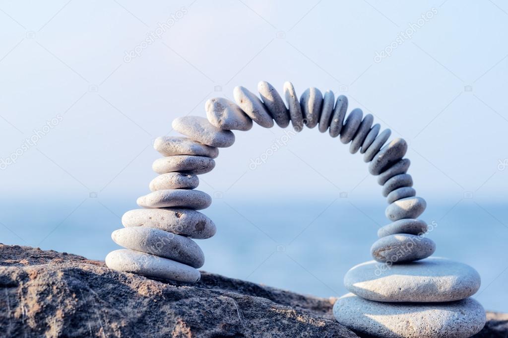 Arch of white pebbles