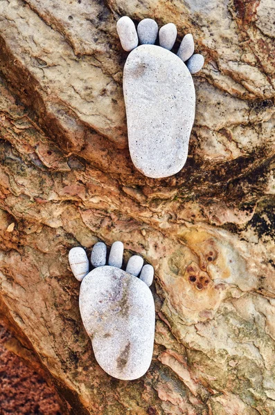Footprint on stones — Stock Photo, Image