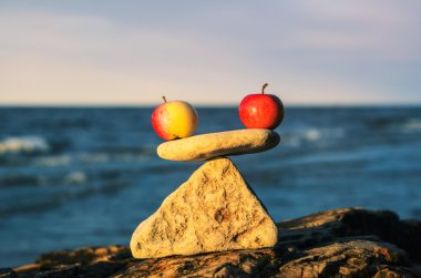 Apples in balance clipart
