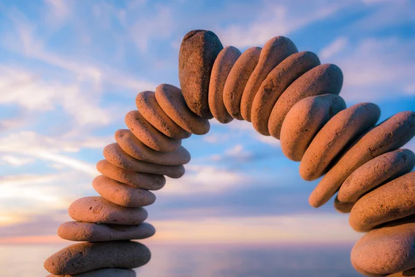 Curve of red pebbles — Stock Photo, Image