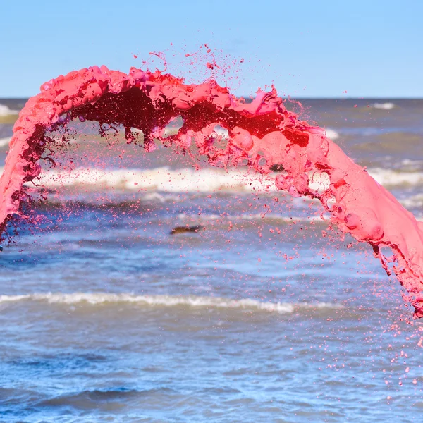 Spritzer roter Flüssigkeit — Stockfoto