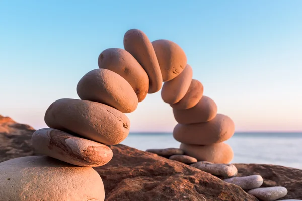 Bending of pebbles — Stock Photo, Image