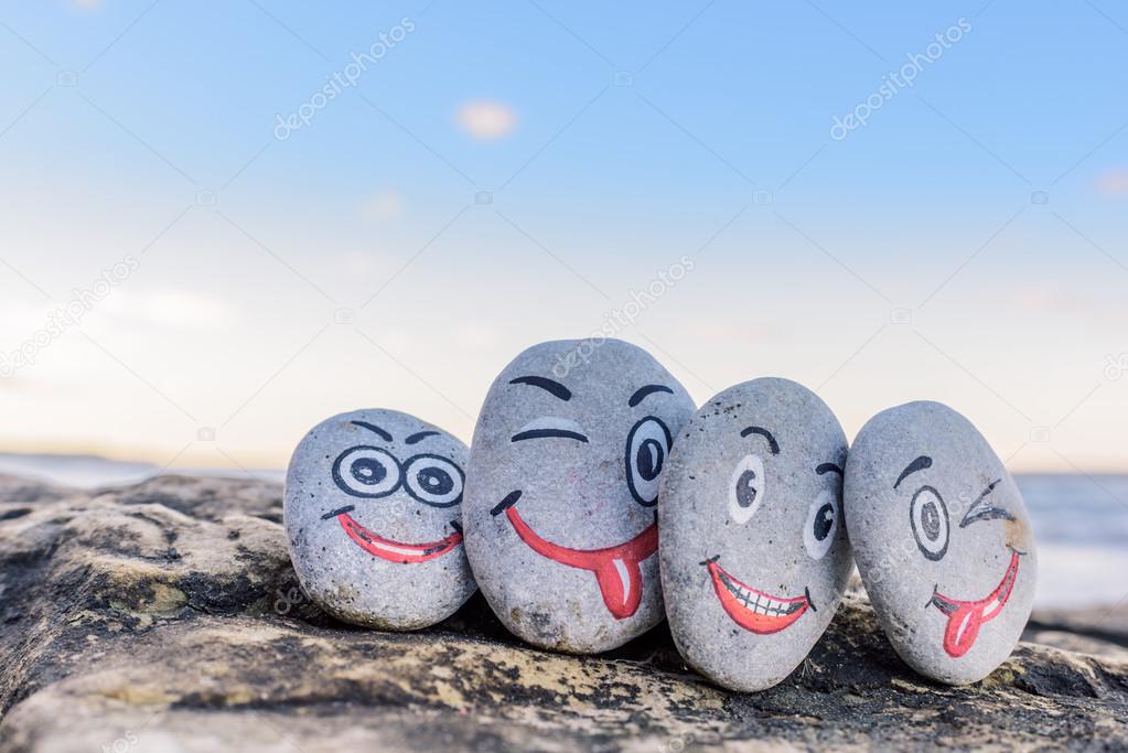 Emoticons on pebbles 