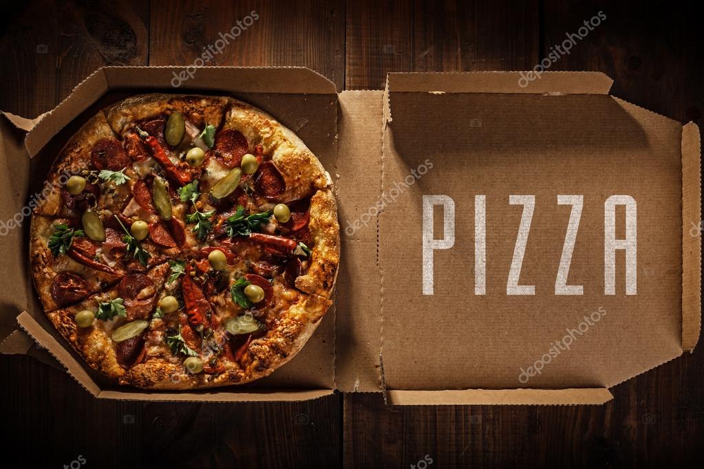 Pizza in the in delivery box — Stock Photo © Artemkas 86747378