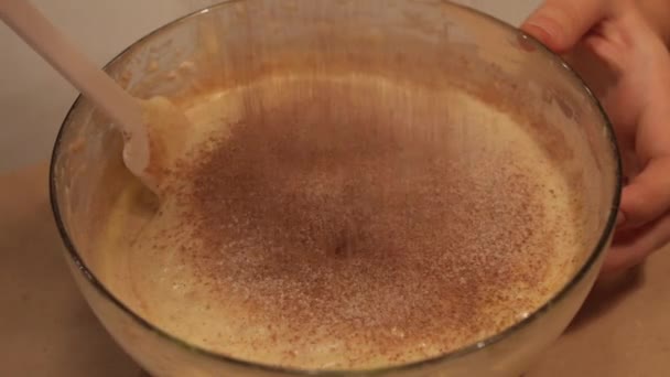 Sprinkling a flour into a bowl in slow motion — Stock Video