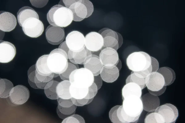 Luz bokeh abstrata na água.Dia Mundial da Água superfície do mar piscar bokeh — Fotografia de Stock