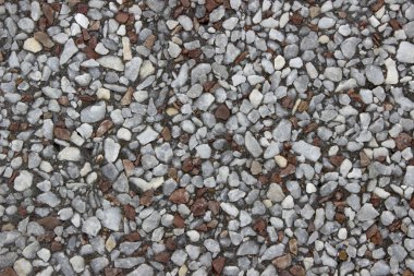 Küçük taş dokusu. Dekoratif renkli taşlar, taşlar ya da inşaat için çakıllar, zemin ya da duvar. Kusursuz doku. 
